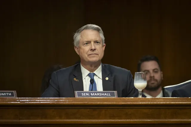 Sen. Roger Marshall at a Senate Agriculture Committee hearing, behind his nameplate